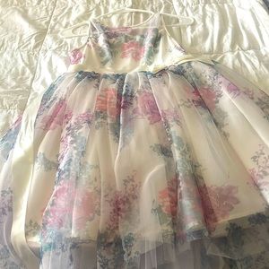 Girls size XL floral print dress. Worn once and in perfect condition!